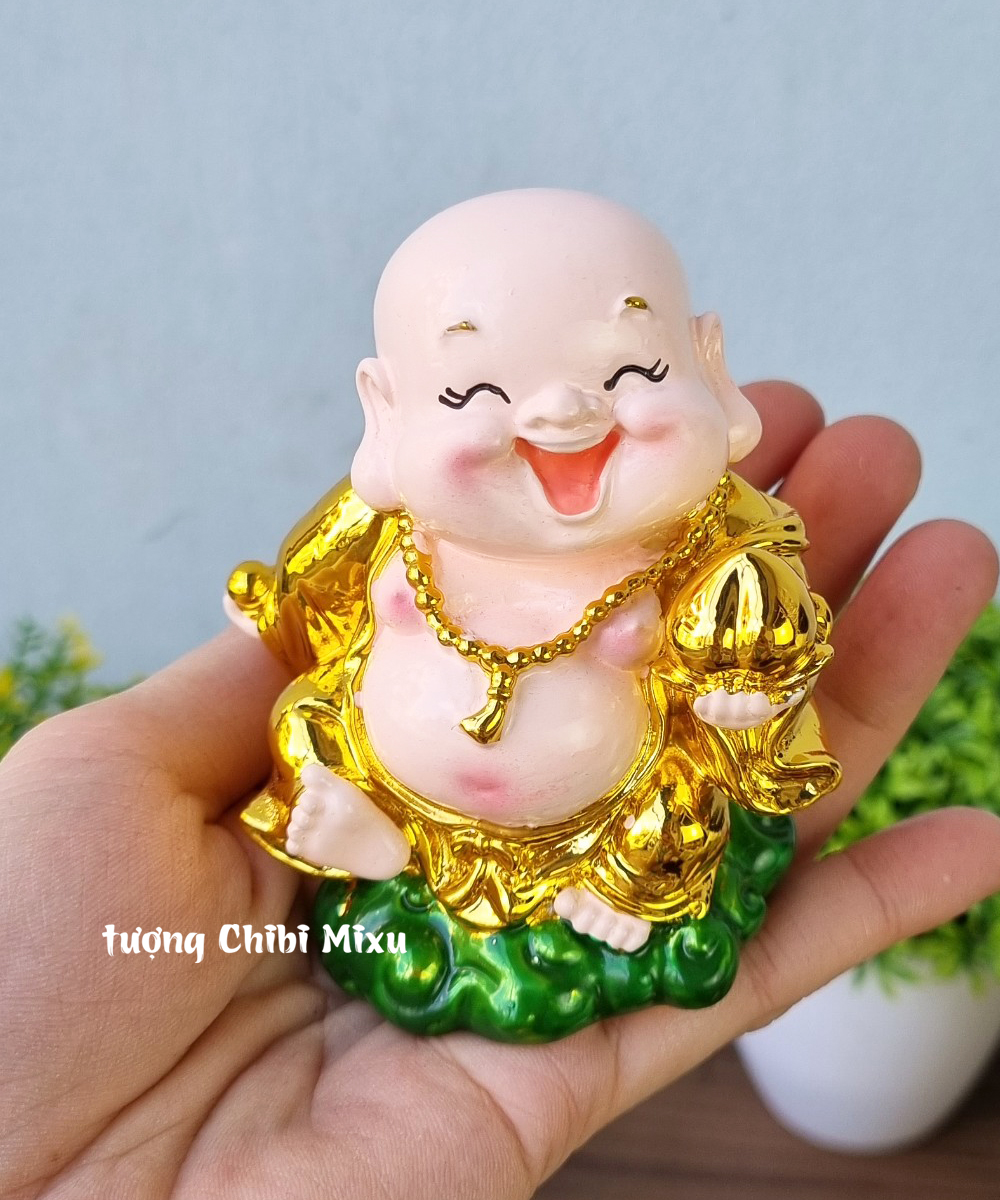 01 tượng Di Lặc 9cm xi vàng cầm trái đào