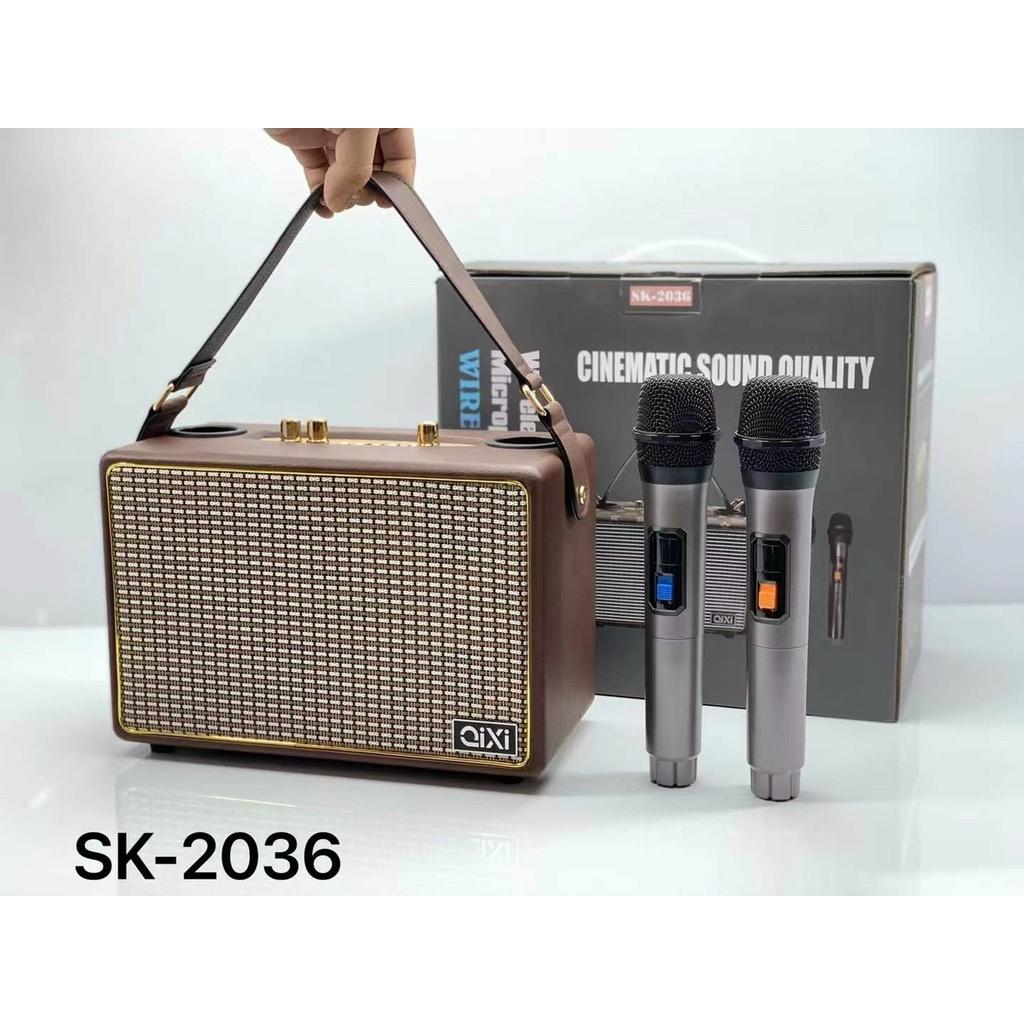 Loa Karaoke xách tay Qixi SK-2036 kèm 2 mic ko dây.