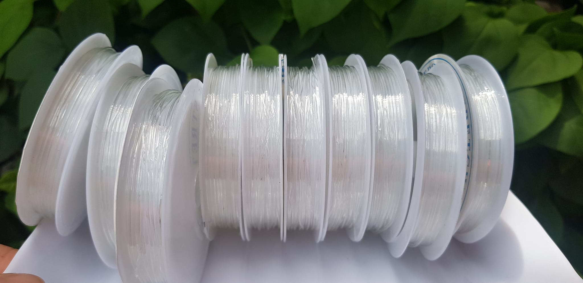 Khoanh tròn cuộn Thun Dẻo Màu trắng nhỏ chuyên xỏ tất cả vòng đeo tay Thun dẻo trắng xỏ vòng tay nam nữ ạ