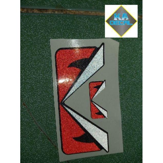 Tem logo mắt khủng long phản quang