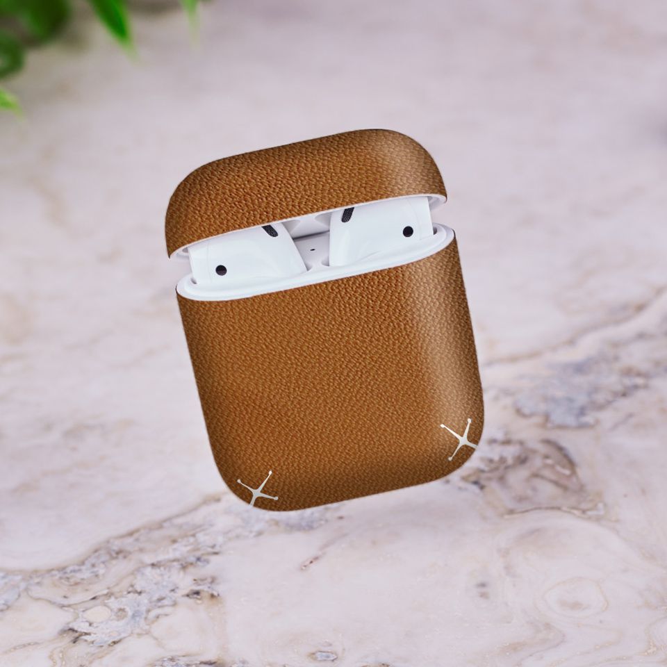 Miếng dán skin chống bẩn cho tai nghe AirPods in hình Vân Da - Da002 (bản không dây 1 và 2)