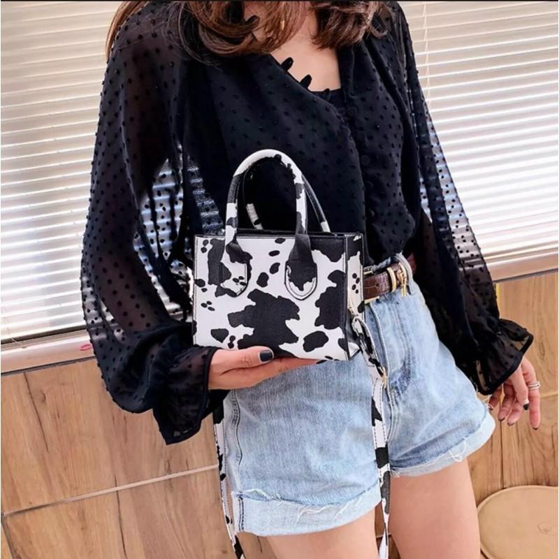 Túi đeo chéo bò sữa