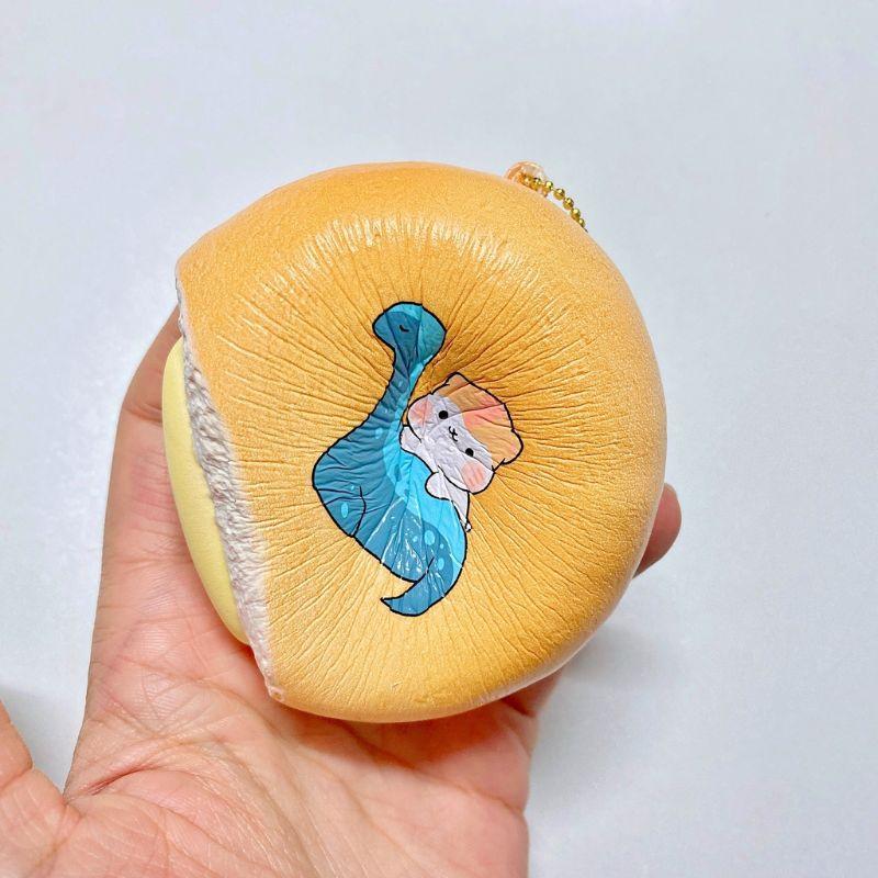 Squishy bánh cắn dở khủng long