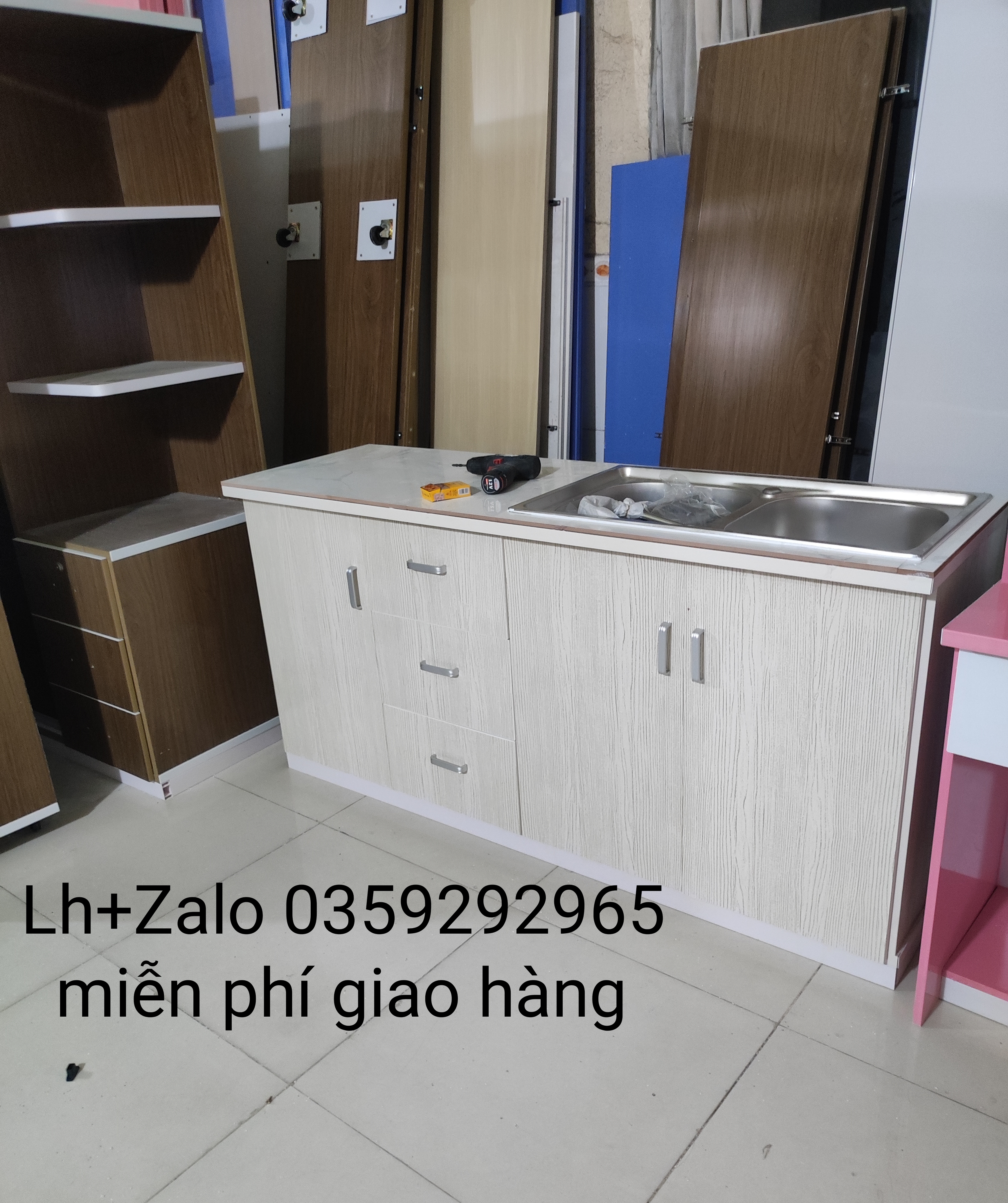 Tủ bếp mini nhựa đài Loan ốp mặt gạch sẵn bồn rửa đôi