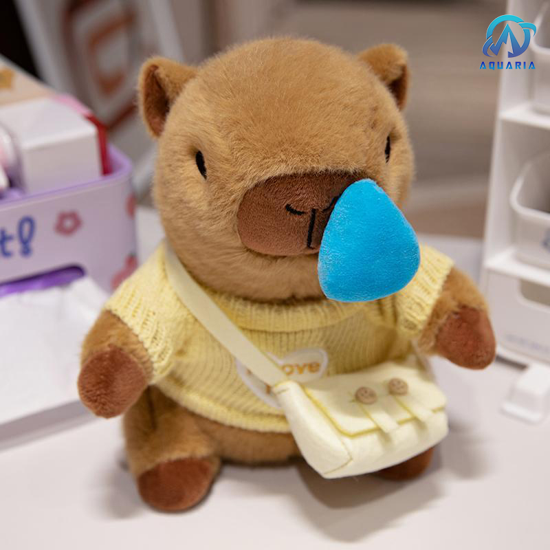 Gấu Bông Thú Nhồi Bông Capybara Mặc Áo Len Đeo Túi Có Thể Kéo Mũi Siêu Đáng Yêu 25cm (Mẫu Áo Len Ngẫu Nhiên)