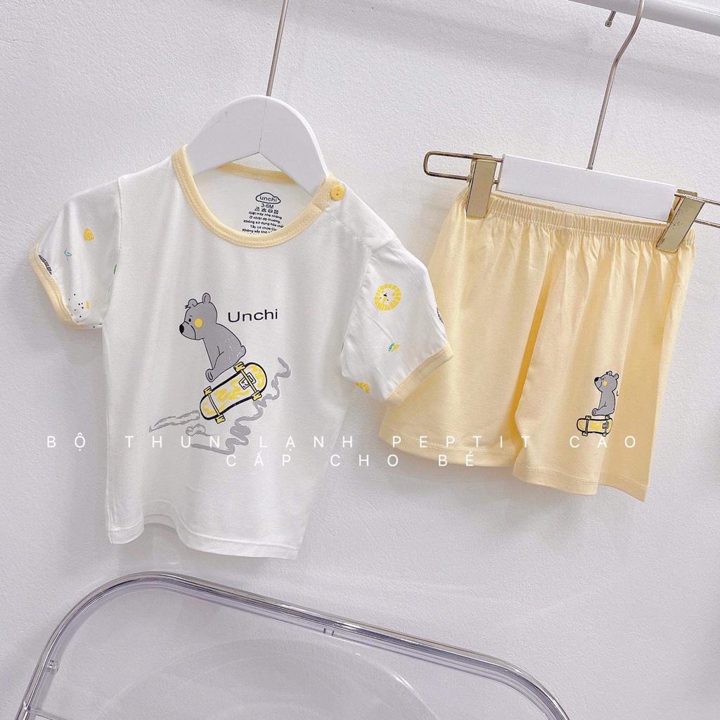 bộ ngắn unchi trắng hình chui đầu cài vai