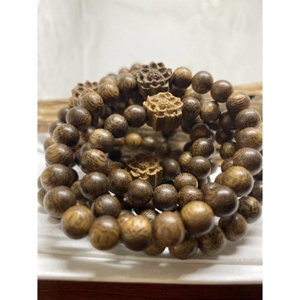Vòng trầm hương tự nhiên mix charm hoa sen