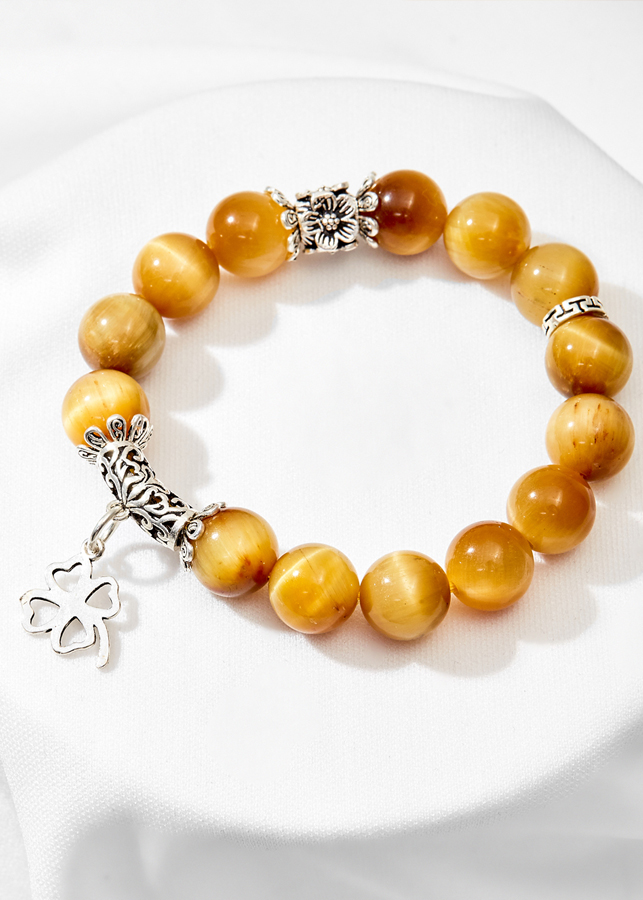 Vòng tay thạch anh mắt hổ vàng phối cỏ 4 lá Ngọc Quý Gemstones