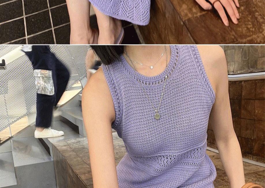 TOBE1SHOP Màu tím rỗng tay áo dệt kim đầm đám đông nhỏ thiết kế cảm giác Pháp khí chất treo Vest dài