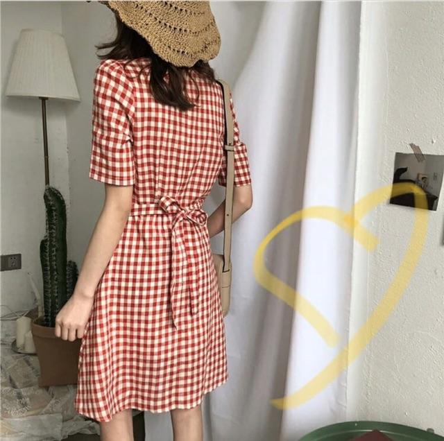 ️ Đầm caro cột eo cổ V đính hàng nút ️