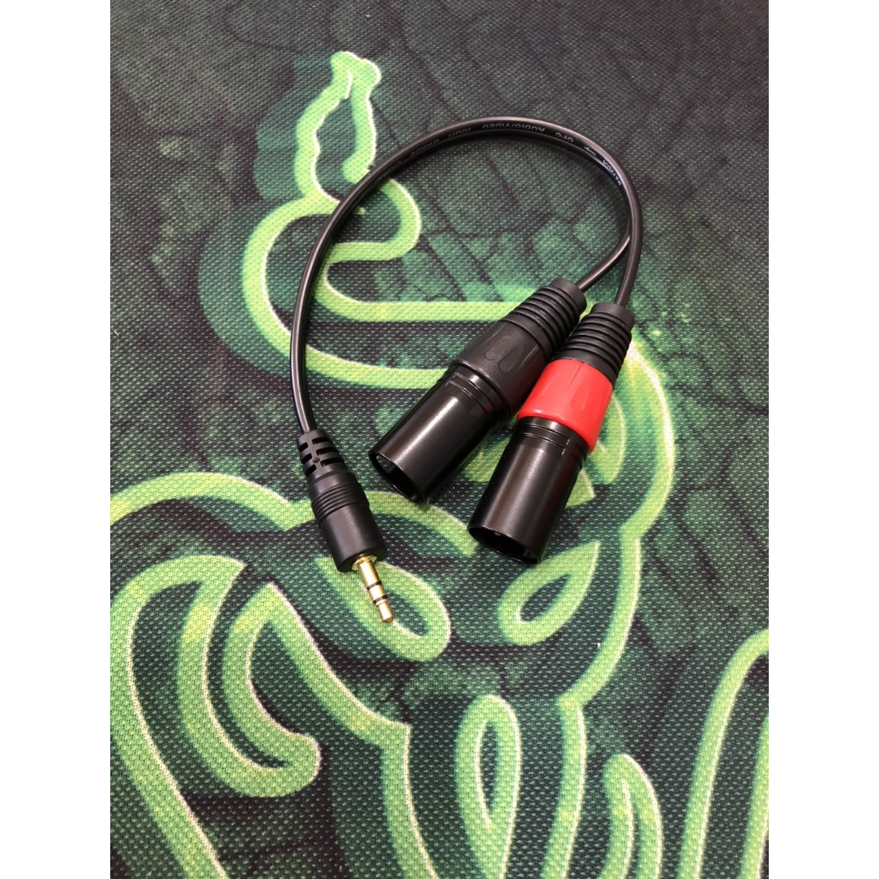 Dây chuyển từ jack 3.5 ly ra 2 đầu ca-non đực