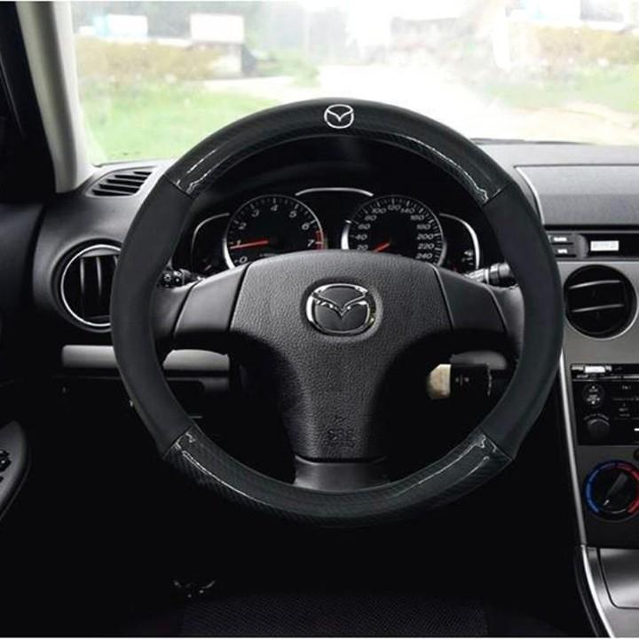 Bọc vô lăng vân Carbon cao cấp Logo theo hãng xe Mazda