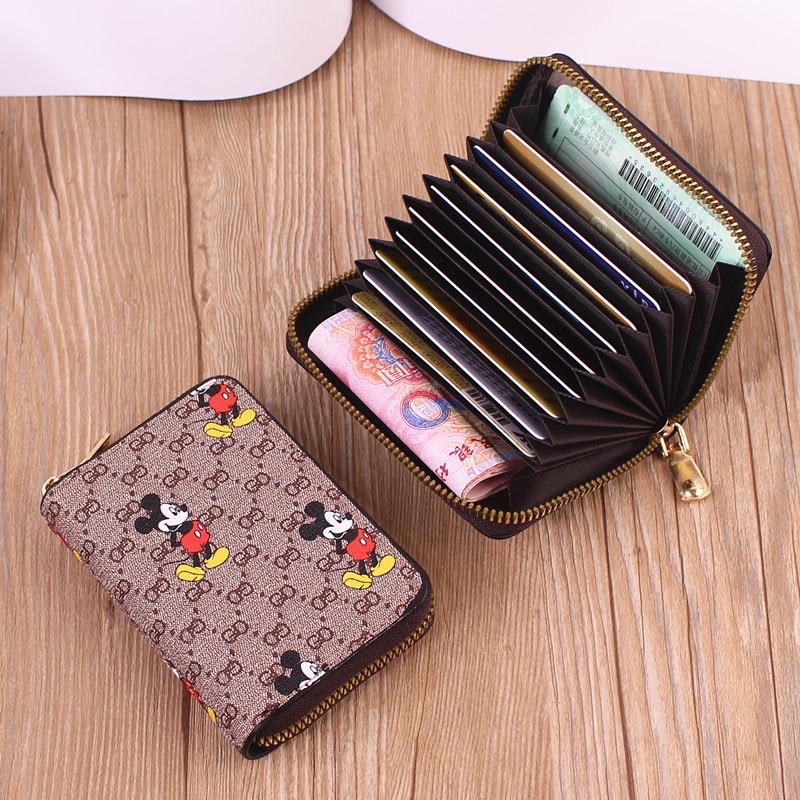 Ví da mini cầm tay nữ nhiều ngăn da PU cao cấp, chất da mềm mịn .dùng đựng thẻ , giấy tờ xe , đựng tiền nhỏ gọn và tiện lợi phong cách nữ tính, trẻ trung , hiện đại