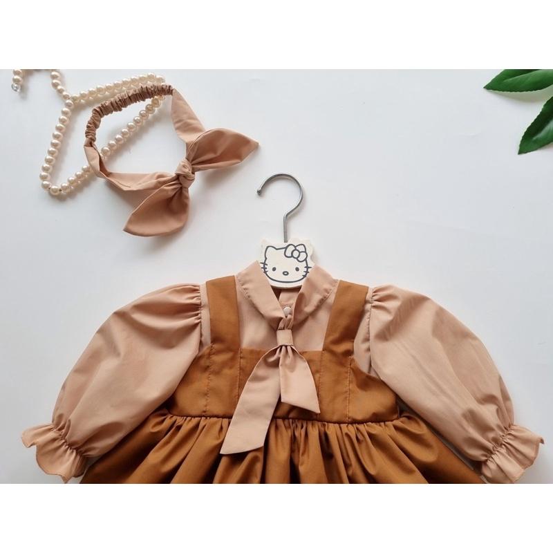 Body váy nâu tây phối yếm sang chảnh cho bé