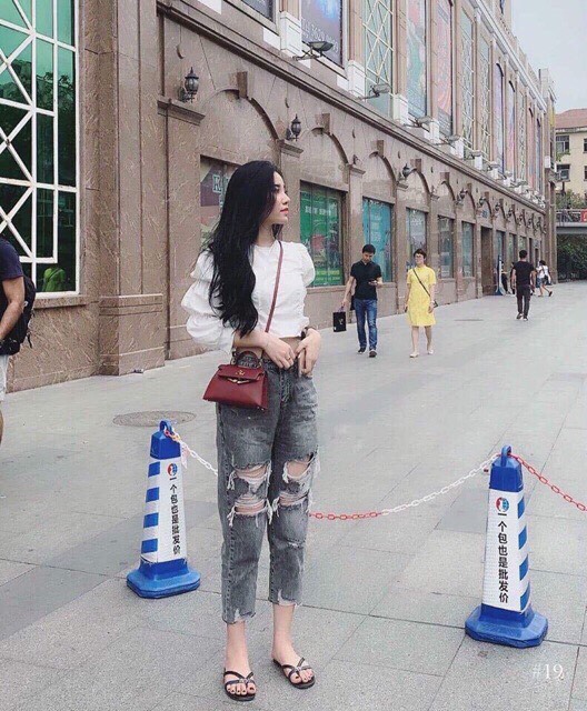 Áo sơ mi trắng cách điệu tay bồng tiểu thư