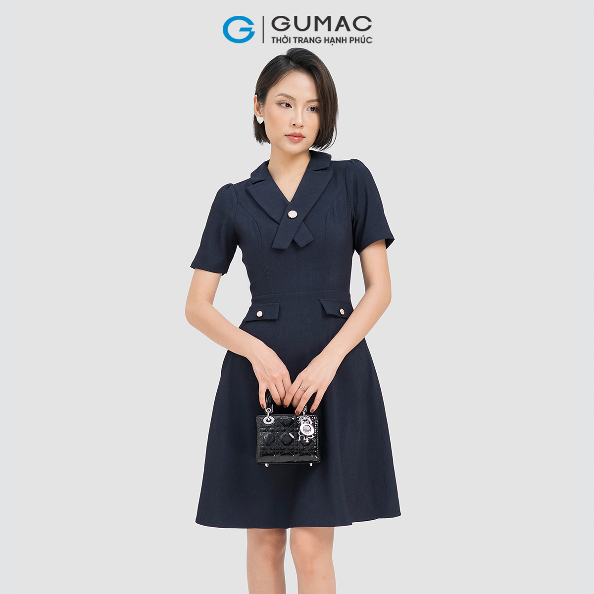 Đầm cổ chéo cách điệu  GUMAC DD04060