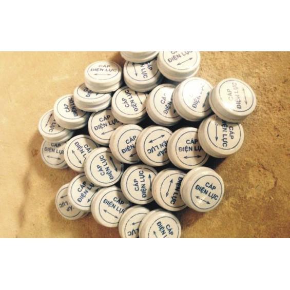 Mốc sứ cảnh báo cáp điện ngầm - hình thật