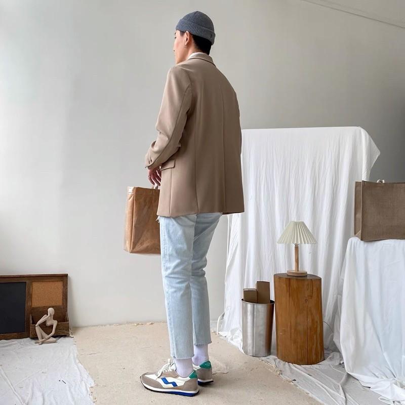 Quần jeans nam skinny rách 1 bên