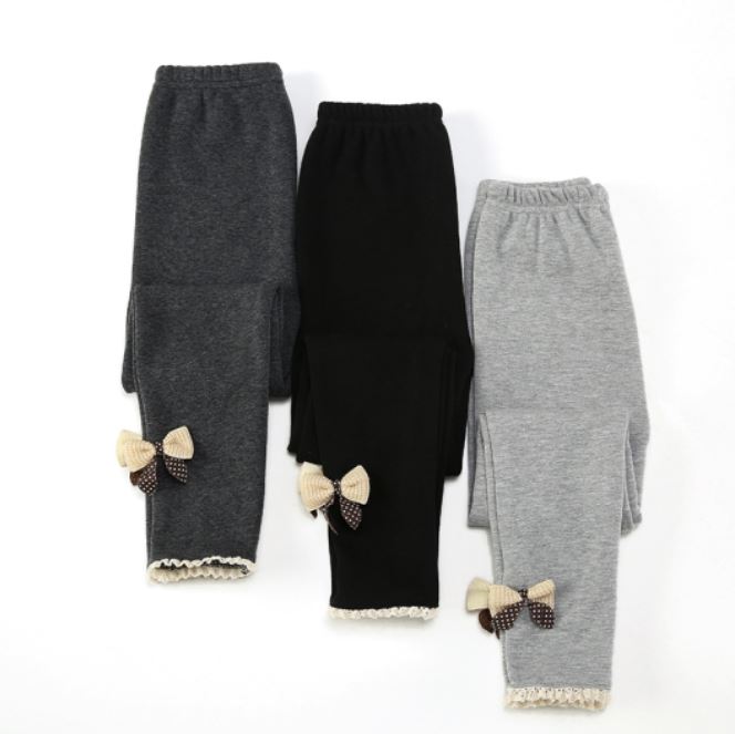 Quần Giả Bò Lót Lông Đính Nơ Cho Bé Gái