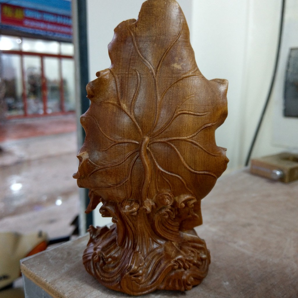 Phật quan âm ngồi lá sen 15x8x6