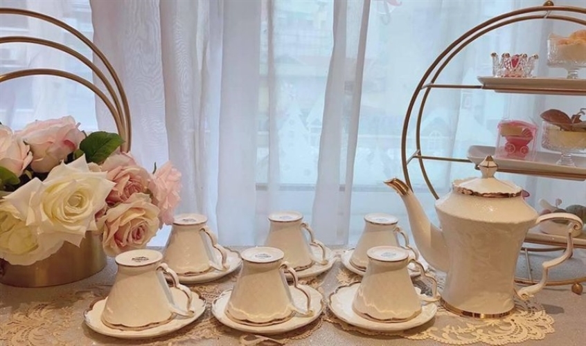 Bộ ấm trà sứ trắng viền vàng