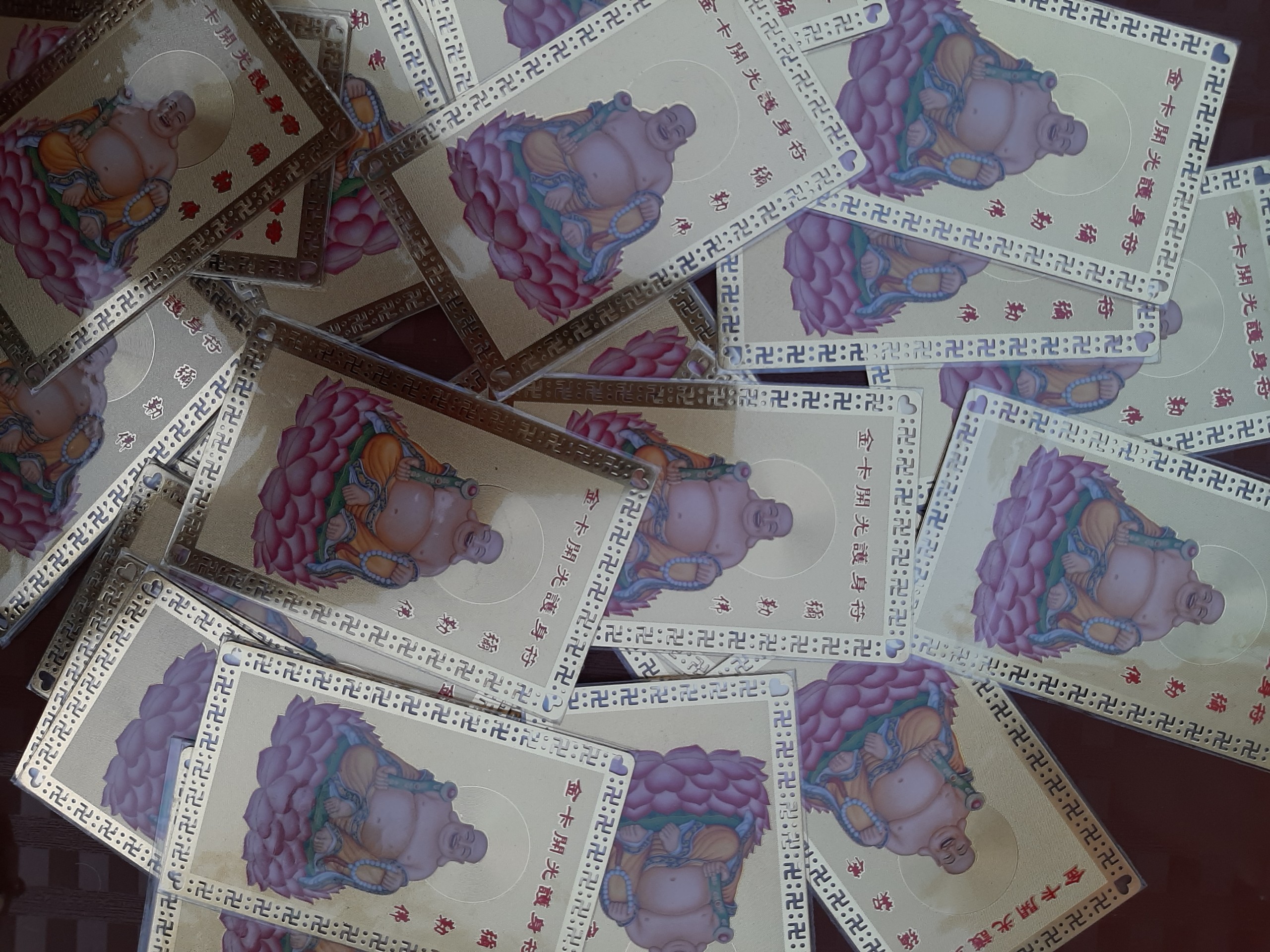 Kim bài Phật Di Lặc thu hút tài lộc