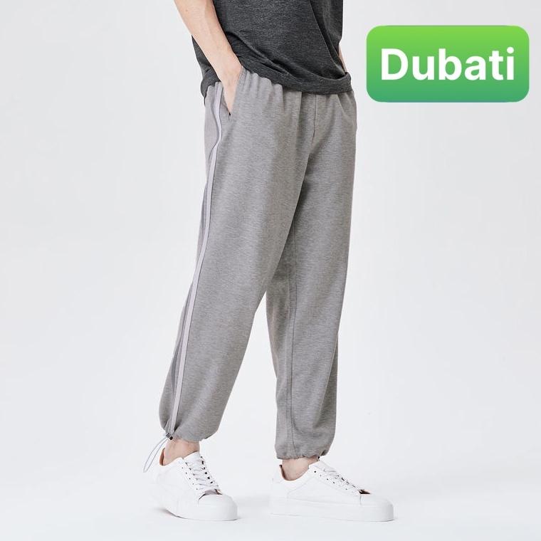 QUẦN JOGER THỂ THAO NAM NỮ 2 LINE - 2 SỌC UNISEX CHẤT NỈ DA CÁ ỐNG SUÔNG RỘNG EO CHUN RÚT DÂY SANG CHẢNH - DUBATIFASHION