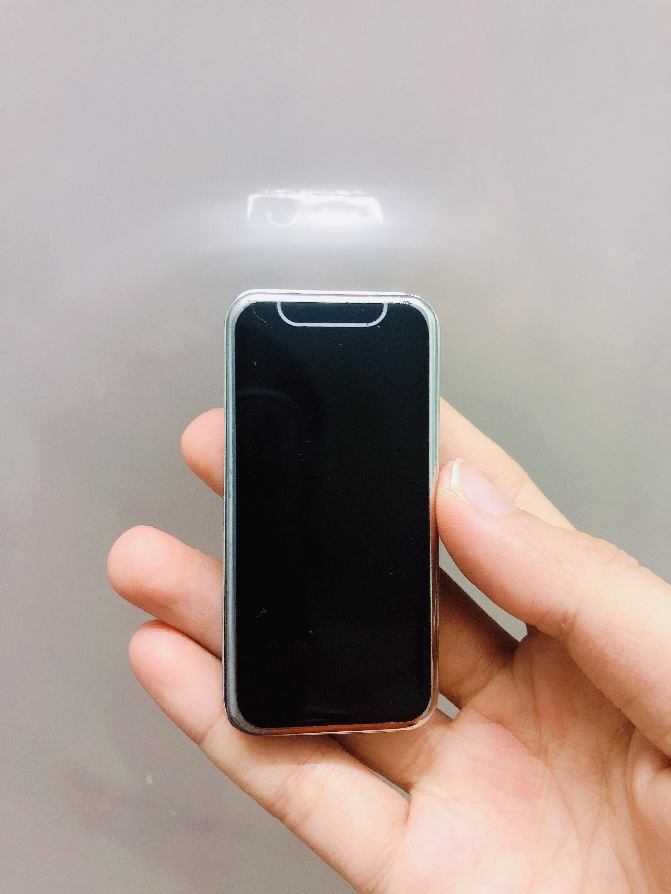 Hột quẹt bật lửa khè hình điện thoại IP mini dễ thương - xài gas