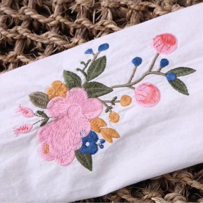 Áo sơ mi bằng cotton màu trắng thêu hoa phong cách Hàn Quốc