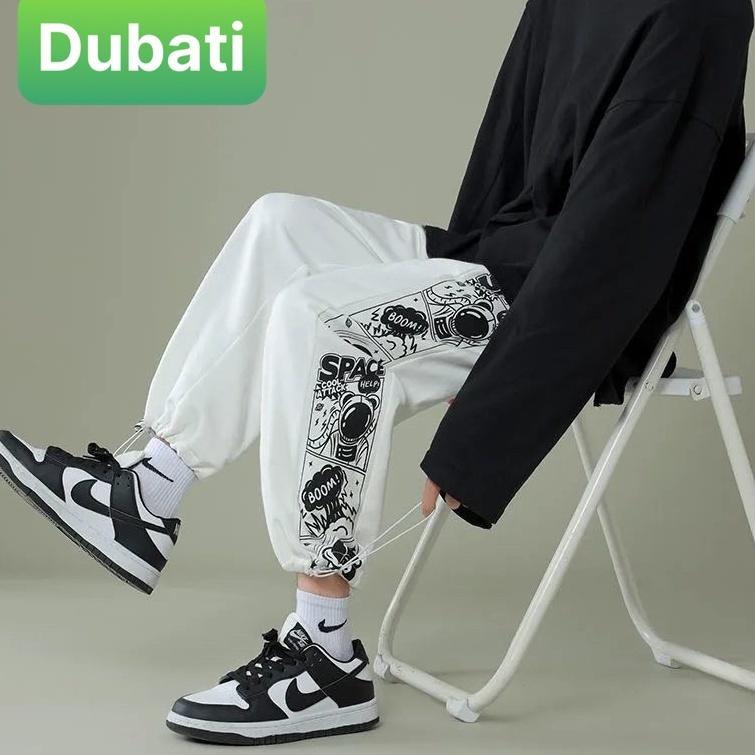 QUẦN JOGGER NAM NỮ UNISEX CHẤT NỈ DÀY DA CÁ ỐNG SUÔNG RỘNG BOOM SPACE RÚT DÂY PHONG CÁCH HOT TREND MÙA HÈ - DUBATI FASHI