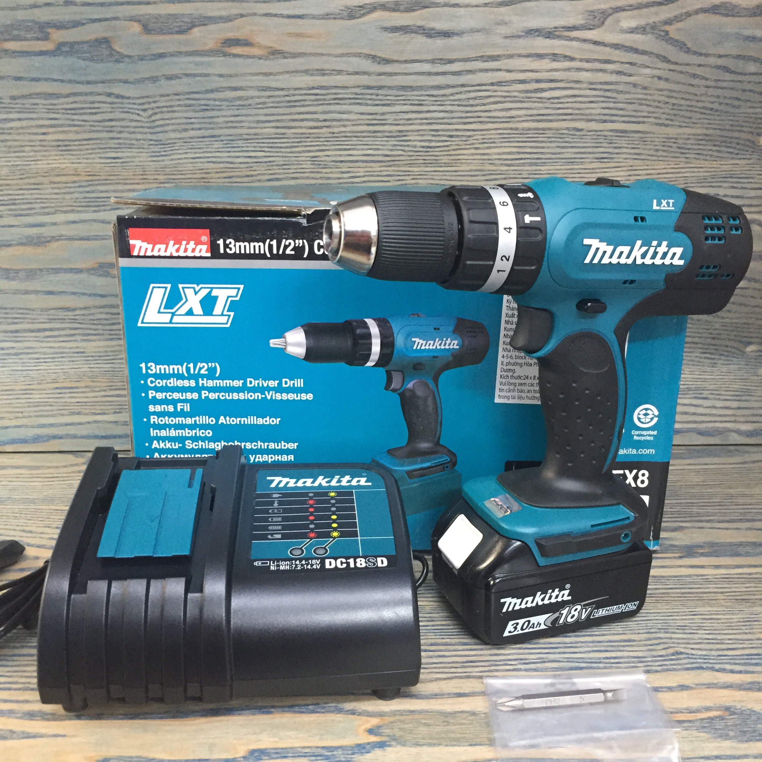 Máy khoan búa và vặn vít dùng pin 18V Makita DHP453SFX8