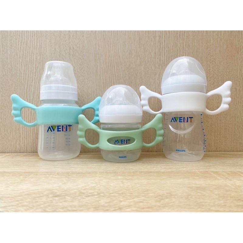 Tay cầm bình sữa Avent, bình sữa cổ vuông HG TC06 / Tay cầm bình sữa silicon cánh tiên