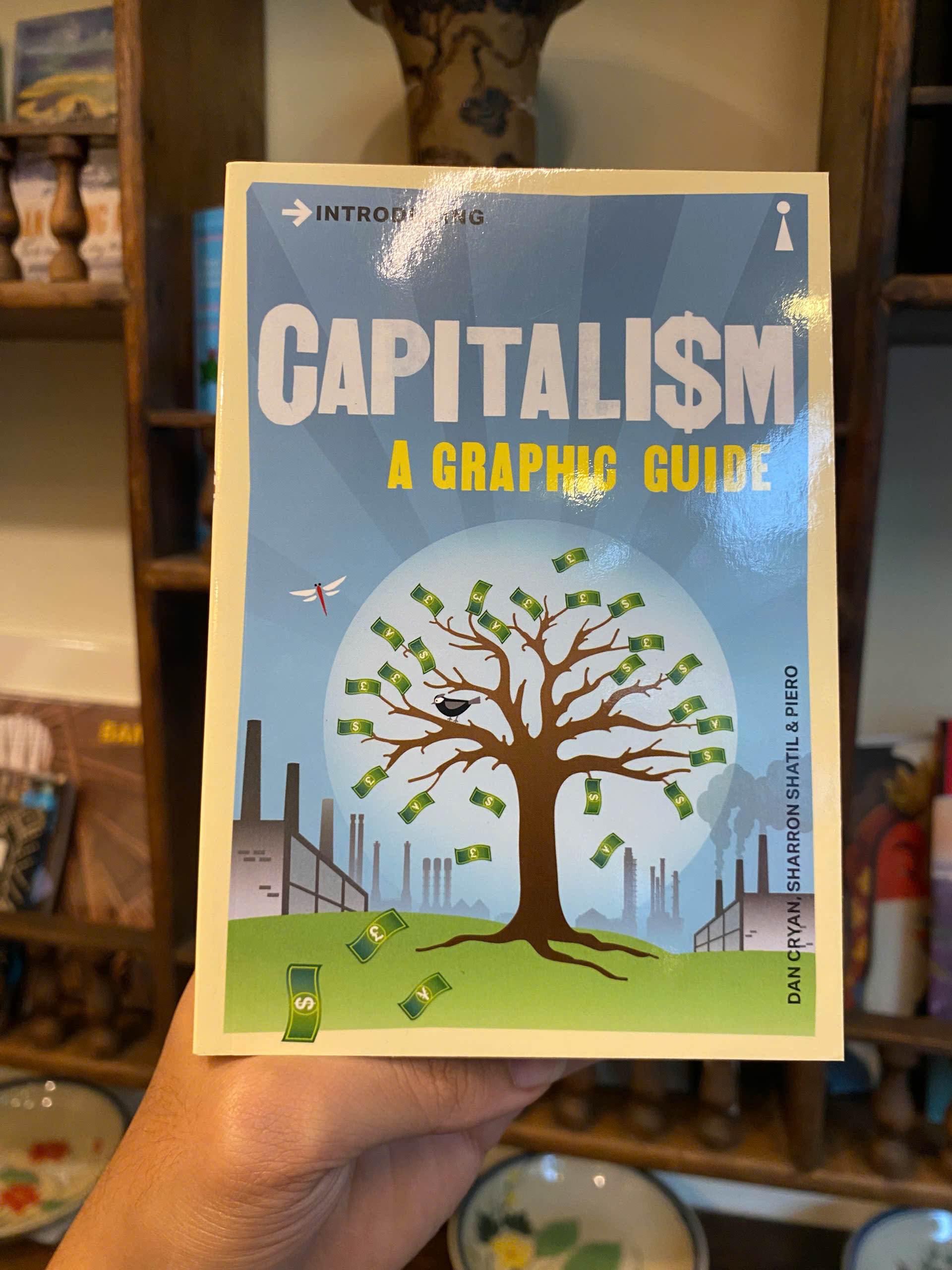 Sách - Capitalism: A Graphic Guide by Dan Cryan - Economics/Nonfiction/ History/English book