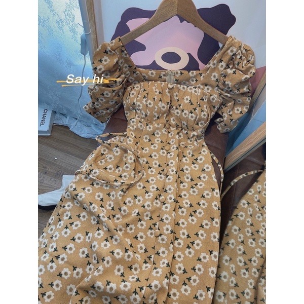 Đầm hoa nhí cổ vuông tay phồng cột nơ lưng tiểu thư