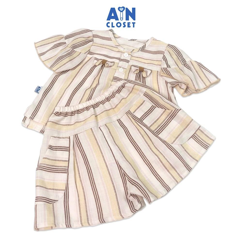 Bộ quần áo ngắn bé gái họa tiết Kẻ nâu tay rũ cotton - AICDBGEXMU4L - AIN Closet