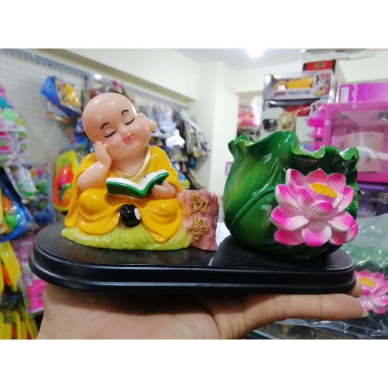 TƯỢNG CHÚ TIỂU ĐỌC SÁCH BÊN CHẬU SEN