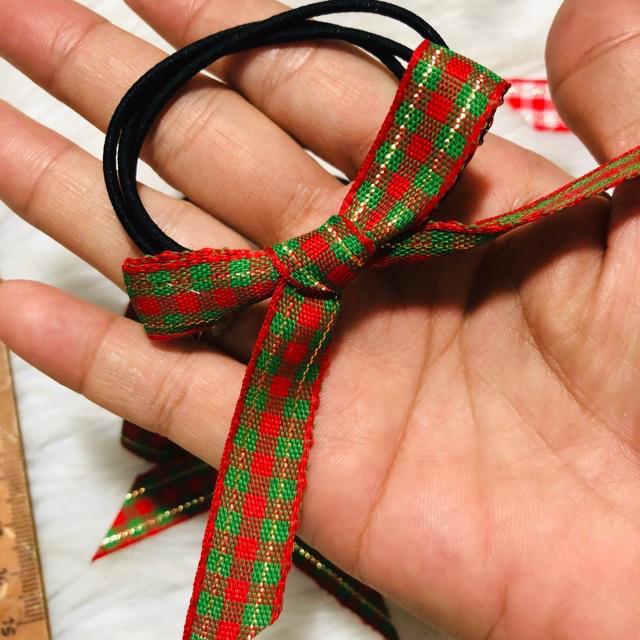 Buộc tóc caro xinh. Có nhiều màu