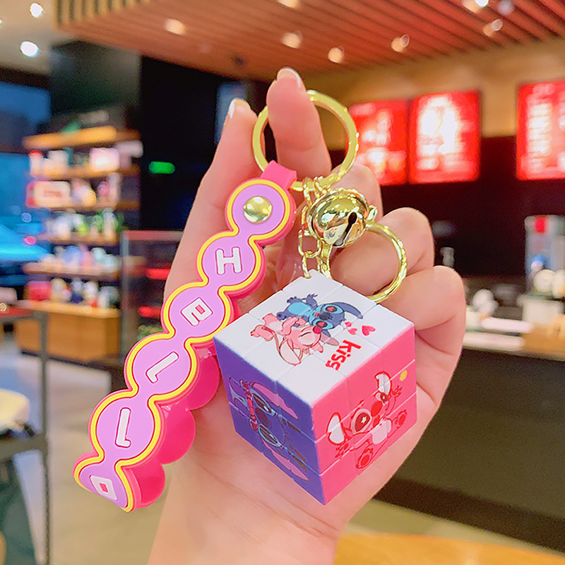 Móc Khóa Rubik Có Chuông Và Dây Đeo Silicon Nhiều Màu Sắc Dễ Thương