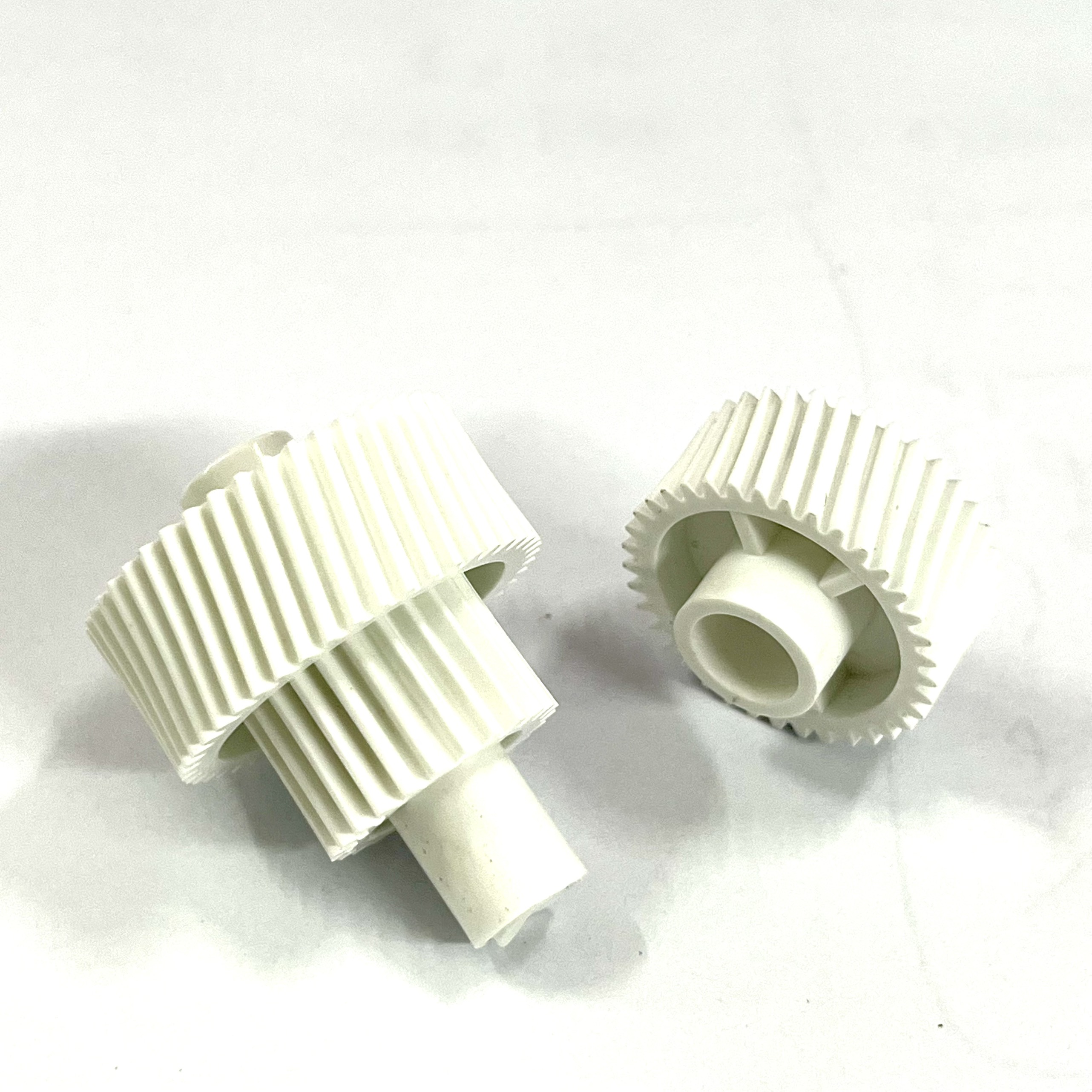 Bộ 2 bánh răng mô tơ từ: Dùng cho máy photocopy Ricoh 1060/ 1075/ 2060/ 2075/ 6500/ 7500/ 8000/ 6001/ 8001/9001/ 6002/ 6502/9002/ 6503/7503 ( HA - Hàng nhập khẩu )