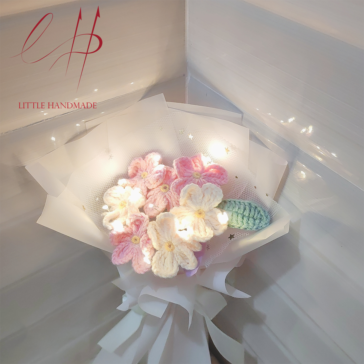 Bó hoa lưu ly màu hồng - vàng 7 bông bằng len handmade
