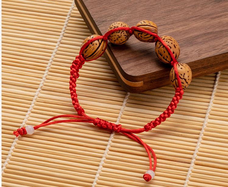 Vòng gỗ đàn hương đỏ hạt hình giọt nước tặng vòng chỉ đỏ may mắn