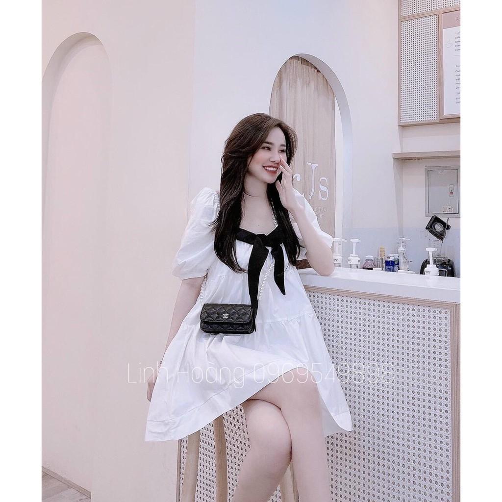 Đầm babydoll trắng cổ vuông tay phồng kèm nơ ngực