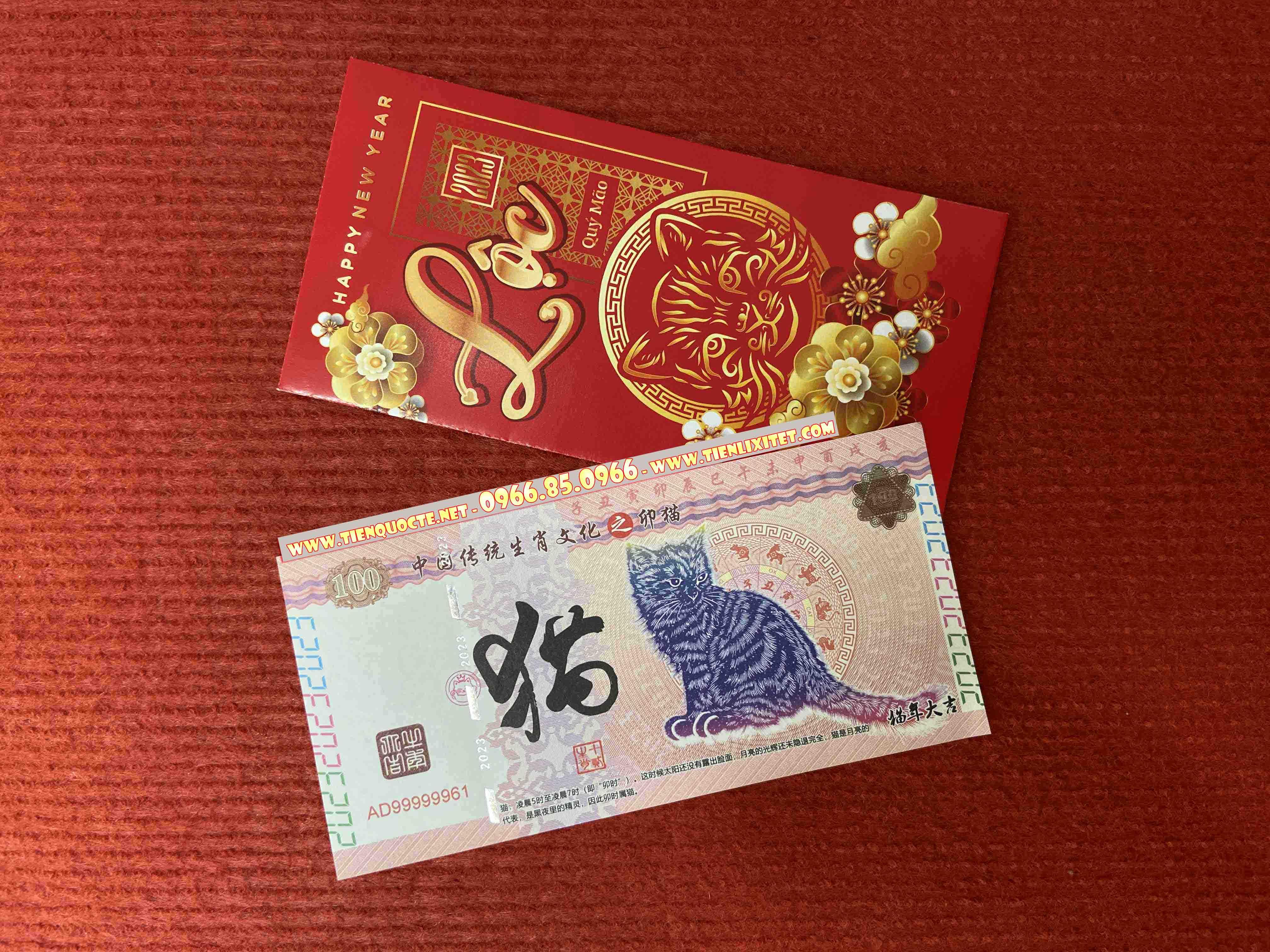 Lì xì đỏ Quà tặng sự kiện Tết - Đồng ti.ền có hình mèo của Trung Quốc Tết 2023, kèm bao đỏ may mắn LGLS00073