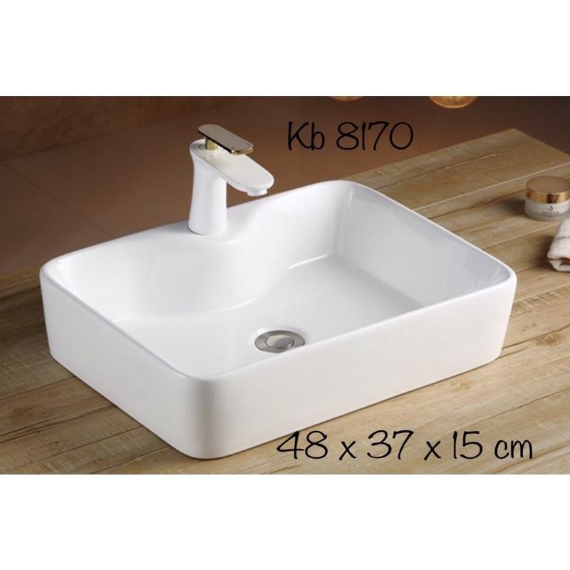 Chậu sứ lavabo bàn đá