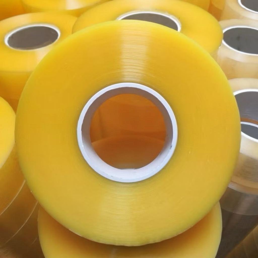 Băng dính và băng keo 1kg/1cuộn Độ Bám Dính Siêu Tốt Chống Thấm Nước Dễ Kéo Dài Và Bền Màu Sắc Trong Vàng Đục Chất Lượng Cao bang dinh