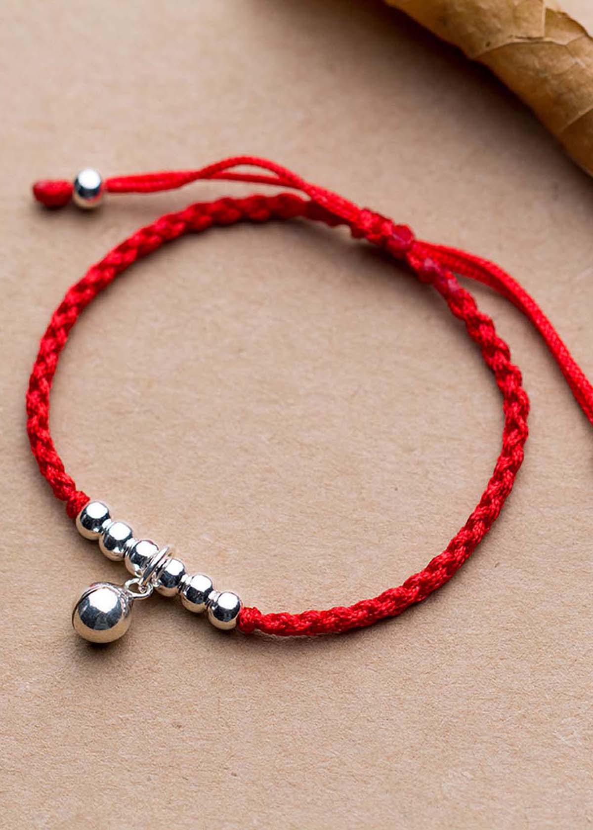 Combo 2 vòng thắt dây đỏ charm chuông - Ngọc Quý Gemstones