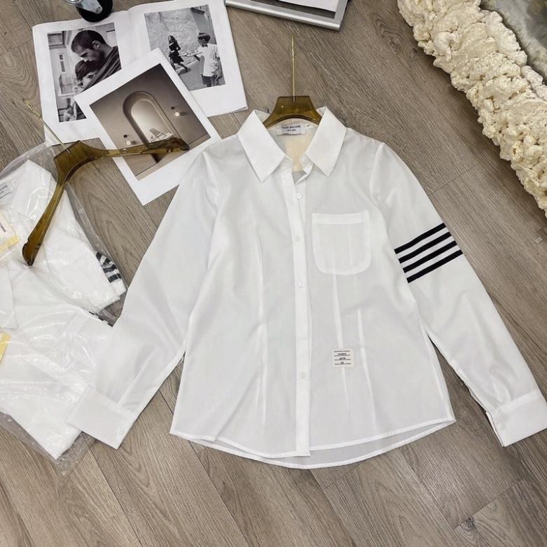 Áo sơ mi nữ trắng dáng công sở viền sọc tay