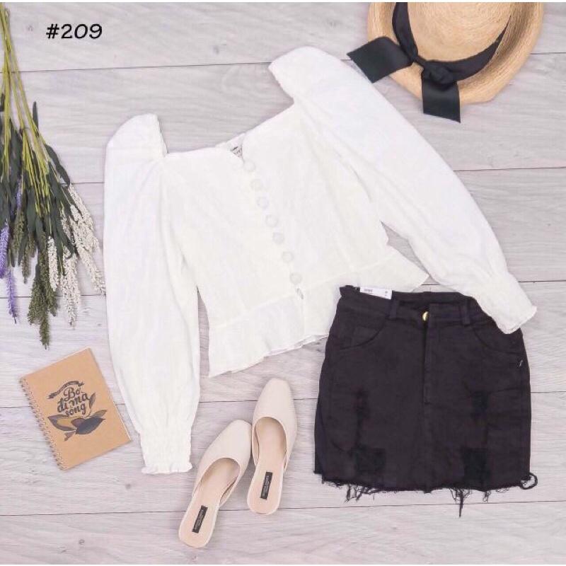 Áo nút bọc peplum