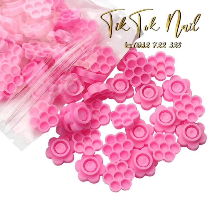 Nút hoa mai chấm keo mi