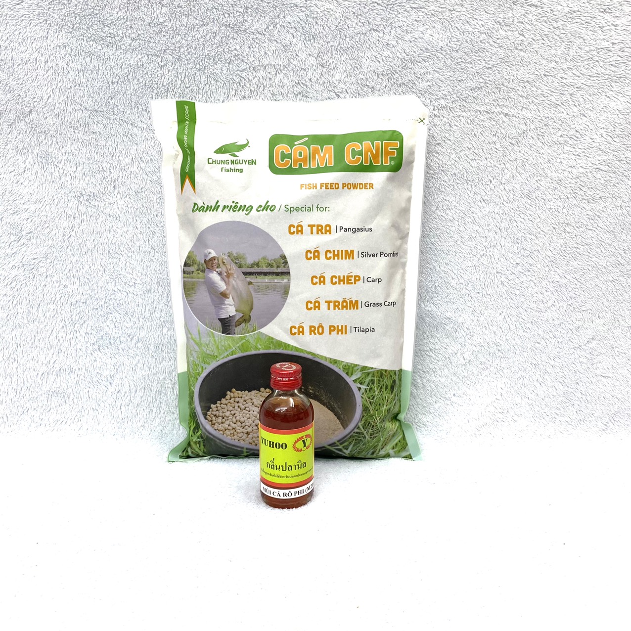 Mồi Câu Cá Rô Phi , Combo 1kg Cám CNF + 1 Chai Tinh Mùi Thái Lan M21 Chuyên Câu Cá Rô Phi